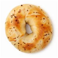 Onion Bagel With Cream Cheese · Fresh homemade onion bagel smothered with cream cheese.