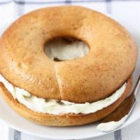Whole Wheat Bagel With Cream Cheese · Fresh homemade whole wheat bagel smothered with cream cheese.