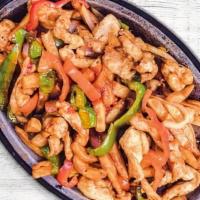 Pollo Salteado · Sautéed chicken strips with sweet onions and mixed bell peppers.