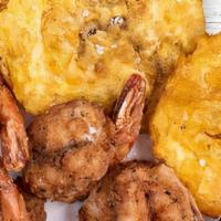 Camarones Empanizados · Breaded shrimp.