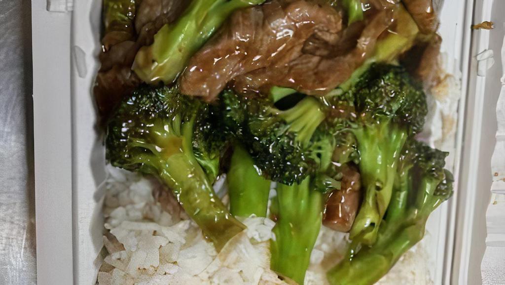 Beef Broccoli · Served with white rice.
