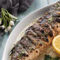 Grilled Bronzini · Whole fish marinated in olive oil and herbs.