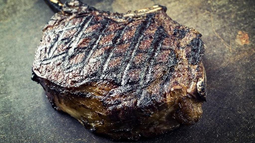 20 Oz Bone In Cowboy Steak · Grilled Prime Aged Steak