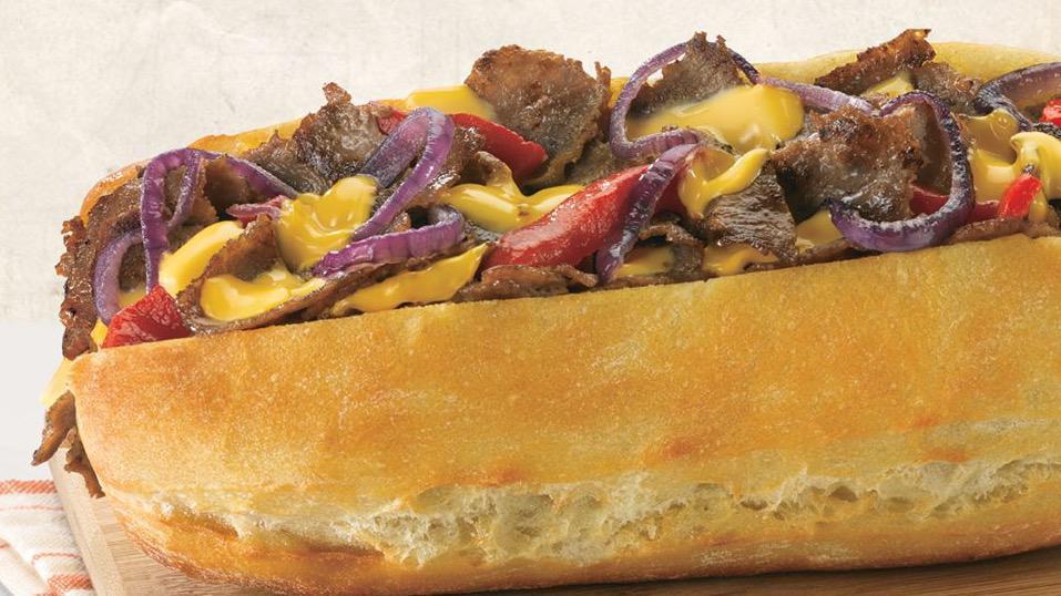 Manhattan Cheesesteak · STEAK ROLL, GRILLED STEAK, AMERICAN CHEESE, ROASTED RED PEPPERS AND GRILLED ONIONS WITH YOUR CHOICE OF  COLESLAW OR MACARONI SALAD