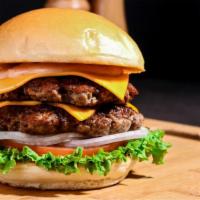 Double Angus Beef Burger · Double juicy angus beef patties stuffed in between a fresh baked bun with the choice of add ...