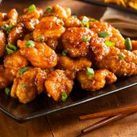 General Tso’S Boneless Chicken Wings · Bone in wings tossed with teriyaki sauce.
