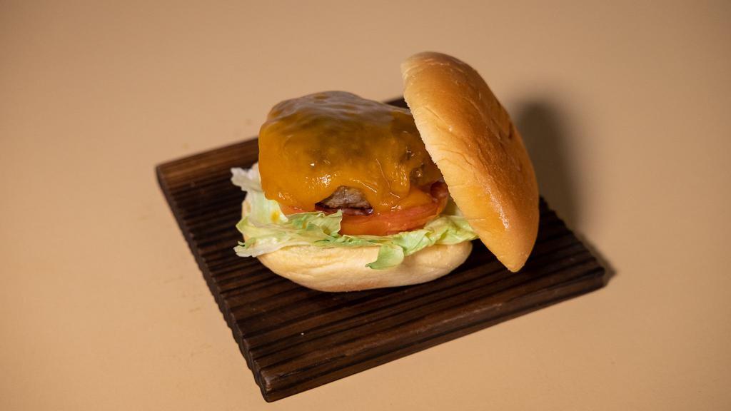 Hokkaido Cheese Burger · House burger with lettuce, tomato, cheese and Japanese mayo