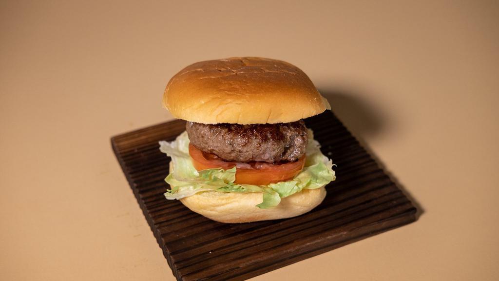 Kochi Yuzu Burger · House burger with lettuce, tomato, Japanese spicy yuzu mayo on a potato bun.