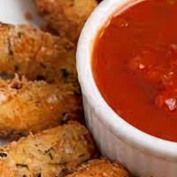 Mozzarella Sticks · With marinara sauce.