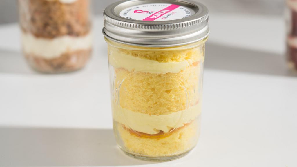 Lemon Cake Jar · We are now offering our Cake Jars in an 8oz size! Our Cake Jars are two servings of moist cake and sweet buttercream in our most popular flavors sealed in a jar creating an extra concentrated taste of mouth-watering goodness. 8oz.