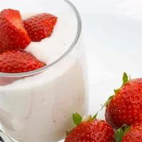 Yogurt With Strawberries And Honey · Sliced strawberries, with strawberry/vanilla/plain Greek yogurt and honey.