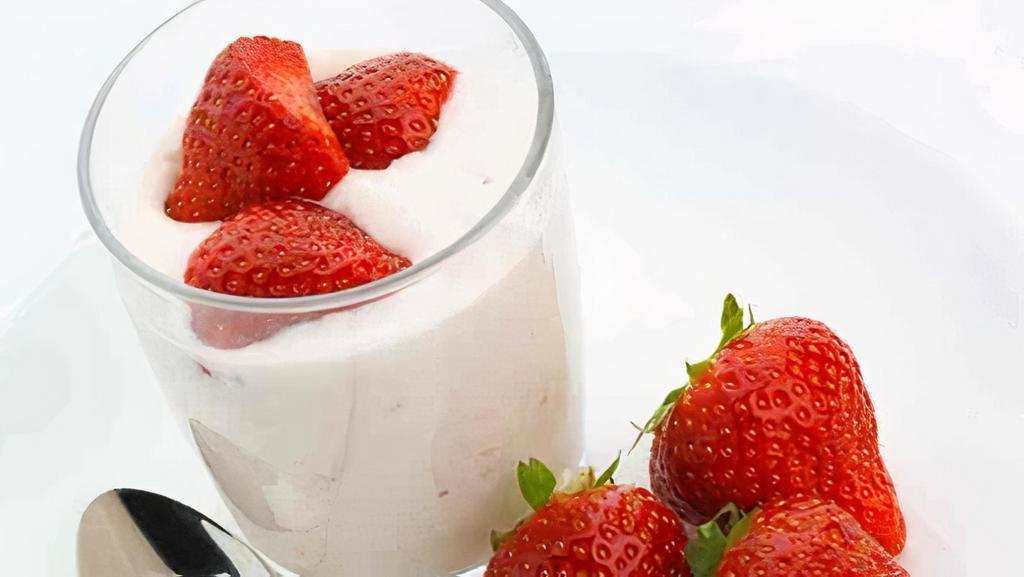 Yogurt With Strawberries And Honey · Sliced strawberries, with strawberry/vanilla/plain Greek yogurt and honey.