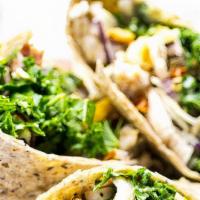 Baby Spring Wrap · Grilled chicken, mix spring lettuce, brussels sprouts, parmesan cheese, whole, Spinach and h...