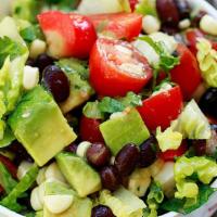 Mexican Salad · Romaine lettuce, baby corn, chopped onion, chopped tomato, parsley, chopped green olives, bl...
