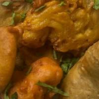 Vegetable Platter · An assortment of vegetable bhajia (eggplant, potato, cauliflower, spinach, and onion fritter...