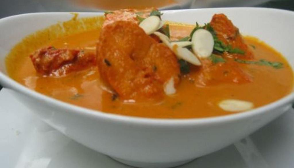 Chicken Tikka Masala · Breast of chicken broiled in tandoor oven cooked in a creamy tomato curry.