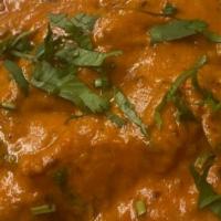 Butter Chicken / Chx Makhani · Chicken cooked with onion, peppers in curried tomato creamy sauce.