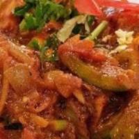 Chx Jalfrezi · Chicken cooked with vegetables in a curry spicy, sweet and sour tomato sauce.