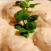 Malai Kofta · Vegetable and cheese dumplings in a mild cashew and almond sauce.