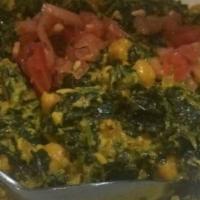 Channa Saag · Chickpeas cooked in a creamy spinach gravy.