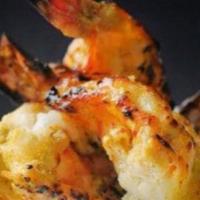 Shrimp Malai Kebab · Jumbo shrimp marinated in yogurt, ginger, white pepper, and saffron.