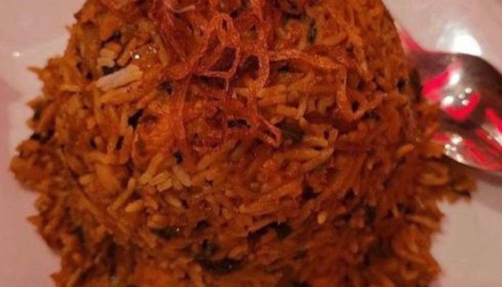 Lamb Biryani · Saffron basmati rice cooked in lamb stew with nuts, raisins and spices.