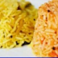 Tamarind Rice · Flavored basmati rice cooked with tamarind , mustard and curry leaves .