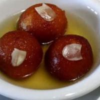 Gulab  Jamun -To Go · Dry milk balls soaked in cardamom flavored honey sugar syrup.