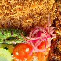 Chicken Biryani · Chicken marinated with special spices layered and cooked with long grain basmati rice.