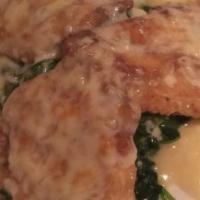 Chicken Florentine · Over sauteed spinach in a lemon white wine sauce topped with mozzarella cheese.