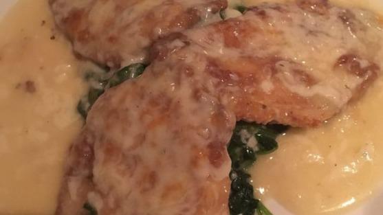 Chicken Florentine · Over sauteed spinach in a lemon white wine sauce topped with mozzarella cheese.