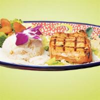 Salmon Grill (New) · Juicy Salmon Grilled To Perfection. Served With White Rice & Sauteed Vegetables.