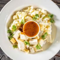 Thai Curry Tofu · tofu, jasmine rice, cauliflower florets, curry, cilantro