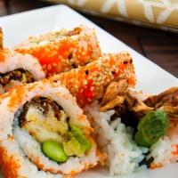 Spider Roll · Soft shell crab, avocado, cucumber, massago with eel sauce and spicy mayo.