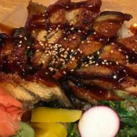 Unagi Don S · Eight pieces grill eel over the rice with Japanese pickle, and seaweed salad.