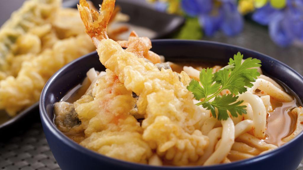 Tempura Udon · 2 pcs of shrimp and vegetable tempura, fish cake, green onion.