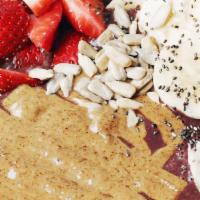 Almond Butter Acai Bowl · Base: Blended with pure acai, banana, almond milk. Topped with granola, banana, strawberry, ...