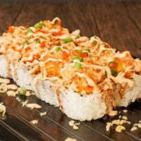 Volcano Roll · Crab tempura, avocado, crunch with spicy lobster, masago, scallion, sweet sauce and spicy ma...