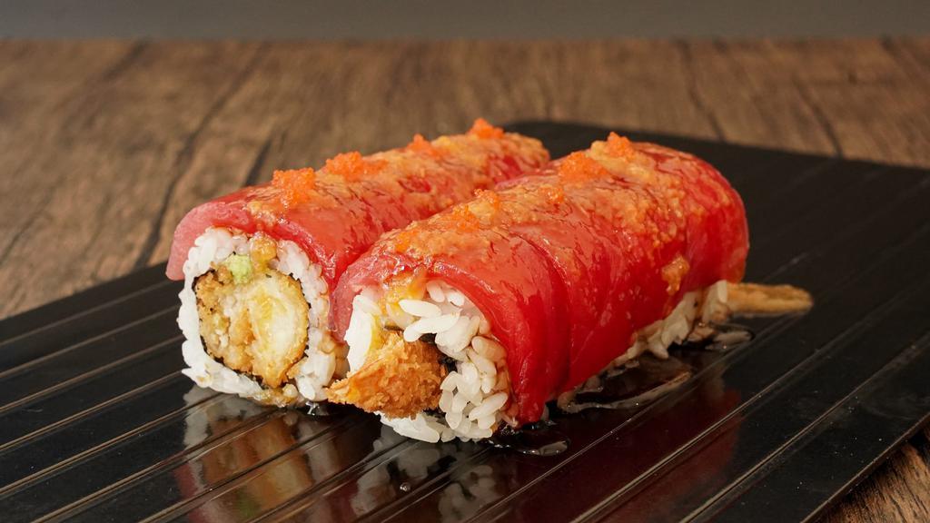 Red Dragon Roll · Shrimp tempura, avocado topped with tuna,masago, sesame and special sauce.