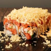 Fire Fight Roll · Spicy tuna, crab, cucumber topped w spicy tuna, crunch, sweet sauce and spicy mayo.