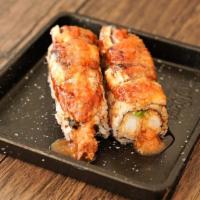 Black Dragon Roll · Shrimp tempura, avocado topped with eel masago, sesame, and special sauce.
