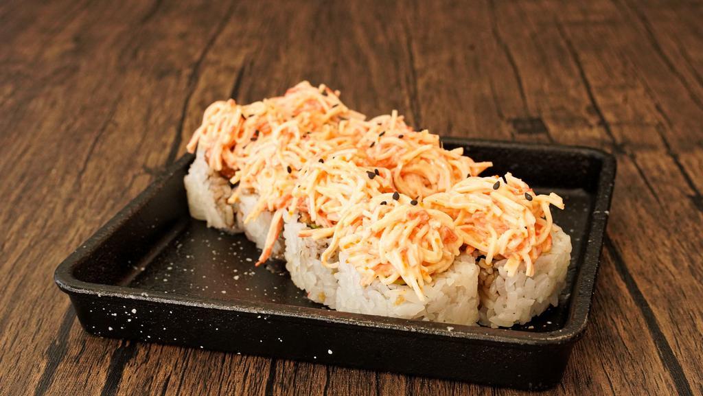 Fire Double Crab Roll · Crab tempura, avocado and topped with spicy crab-nobu style.