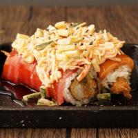 Johnny Roll · Shrimp tempura, avocado topped w tuna, salmon and spicy crab salad.