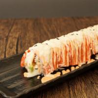 Snowy Roll · Salmon, cream cheese, avocado topped with crab meats, spicy mayo and pineapple mango sauce