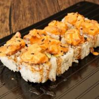 Rising Octopus Roll · Crab tempura, avocado topped with spicy octopus and nobu style.