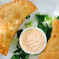 Empanadas · Two empanada of your choice.