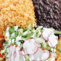 Burrito Bowl · With rice, beans, pico de gallo, lettuce, tomato, onions, and sour cream.