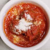Polpette Al Sugo · Housemade beef and pork meatballs, San Marzano tomato sauce, Parmigiano Reggiano DOP. (4 pie...