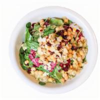 Insalata Di Ceci · Marinated Chickpeas, Brown Rice, Dried Cranberries, Spinach, Radicchio, Toasted Almonds, Her...