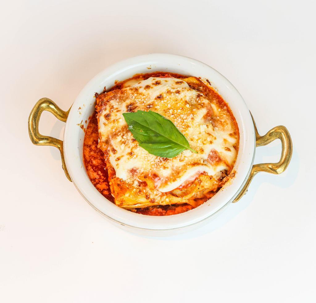 Lasagna Emiliane · Housemade Lasagna Sheets, Ragù alla Bolognese, Besciamella, Parmigiano Reggiano DOP